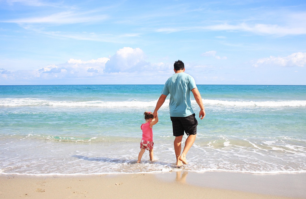 Family walking together on a beach