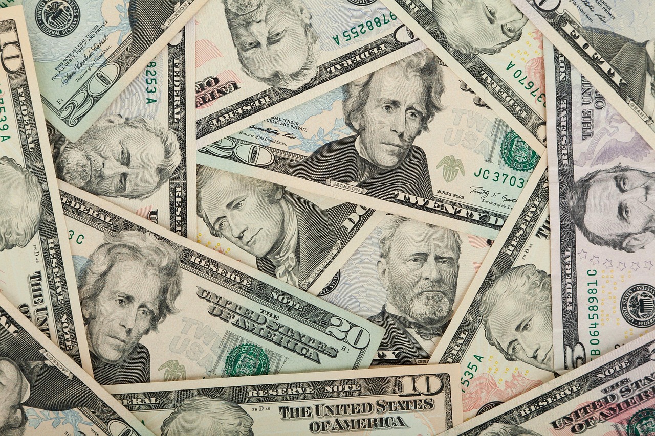 US dollar bills stacked together